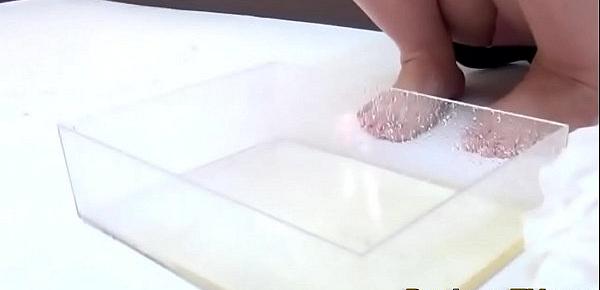  Urinating japanese cuties fill up glass box
